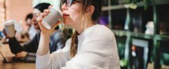 blond woman having a cup of coffee