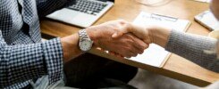 Black Coffee business people shaking hands in agreement